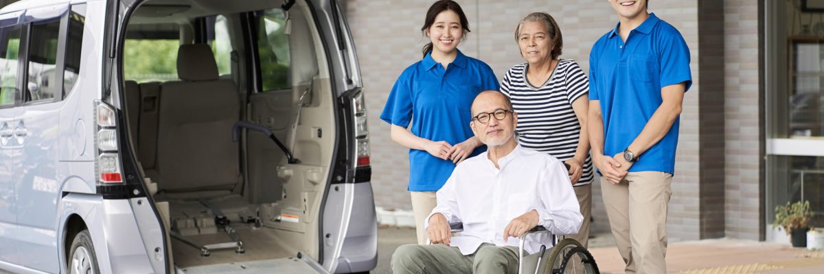 Wheelchair riding elderly and caregivers